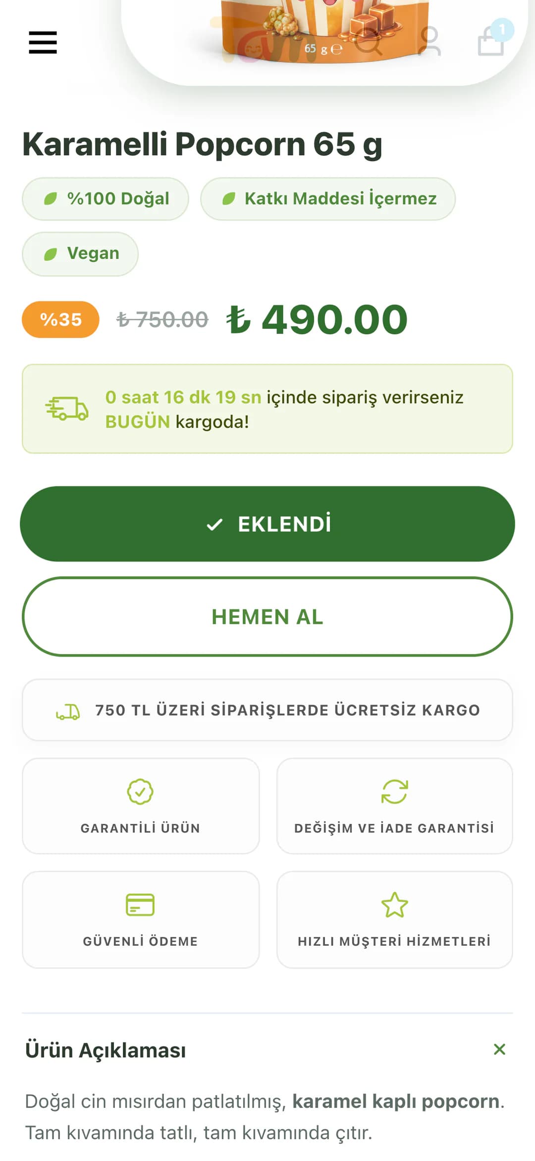 Tam ürün sayfasında SEPETE EKLE'ye dokunulduktan hemen sonra telefonda: düğme koyu yeşile dönmüş ve onay işaretiyle EKLENDİ yazıyor, ürün görselinin küçülen kopyası sepet simgesine doğru uçuyor. Sepet uygulamasının aynı anda açılan çekmecesi bu karede gösterilmiyor.