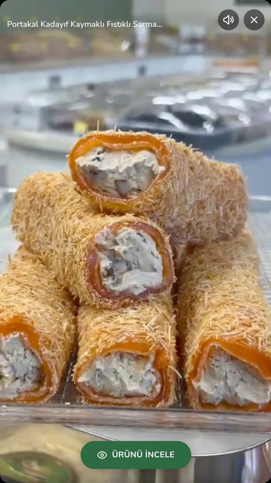 A product story opened from the Filinta Kuruyemiş homepage: a video of orange kadayif rolled lokum with clotted cream and pistachio, the product name on top and a view-product button below.