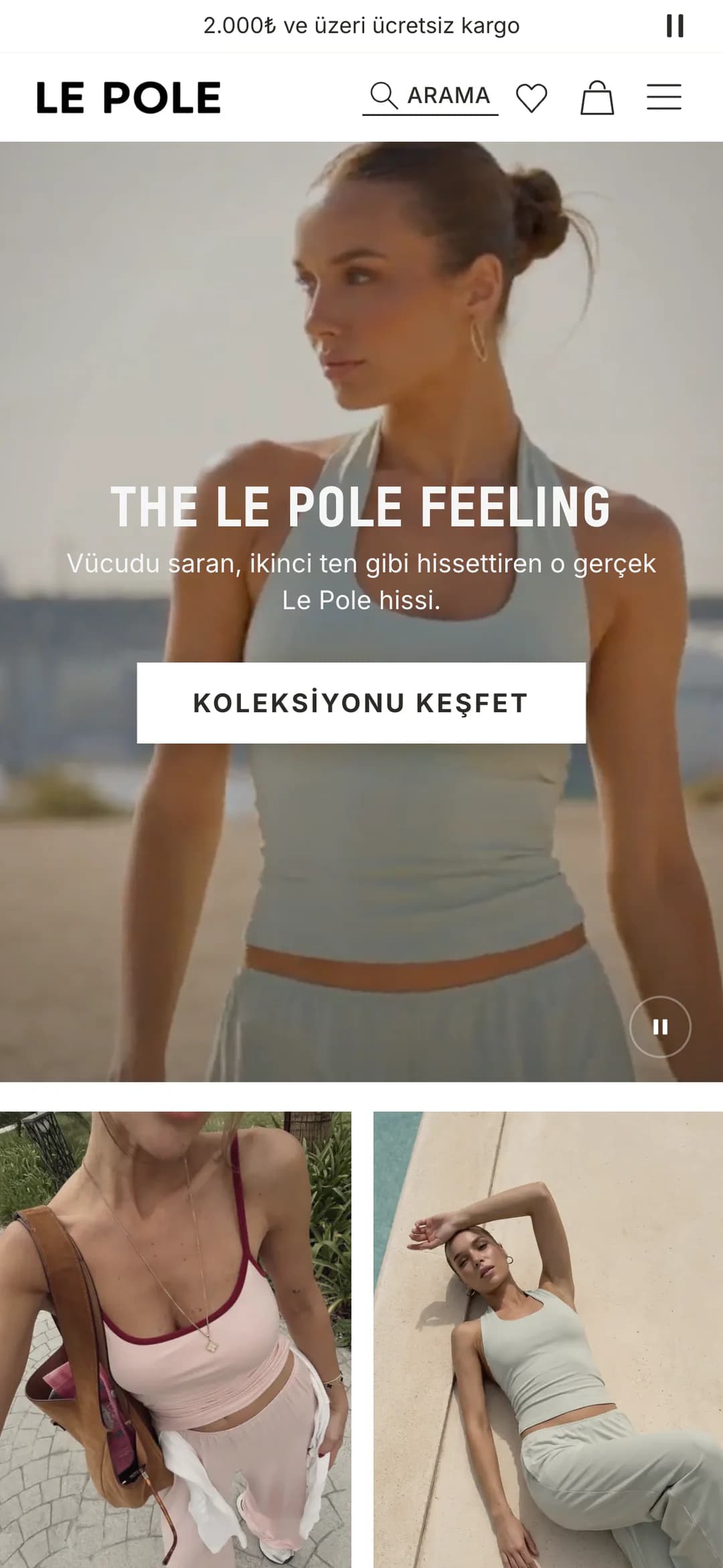Le Pole'ün telefondaki ana sayfası: üstte 2.000₺ ve üzeri ücretsiz kargo duyurusu ve LE POLE logosu, açılış videosunda açık yeşil halter atlet giyen model, The Le Pole Feeling başlığı ve Koleksiyonu Keşfet düğmesi; altta koleksiyon kutularının fotoğrafları.