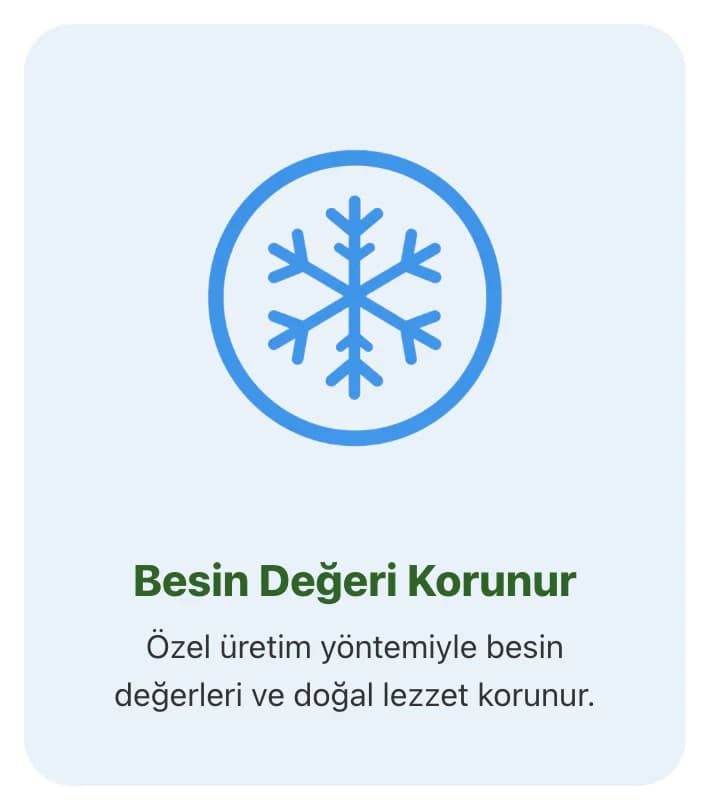 Tam ana sayfasındaki Neden Tam? kartlarından biri: açık mavi zeminde mavi halka içinde kar tanesi simgesi, Besin Değeri Korunur başlığı ve özel üretim yöntemiyle besin değerlerinin ve doğal lezzetin korunduğunu anlatan açıklama.