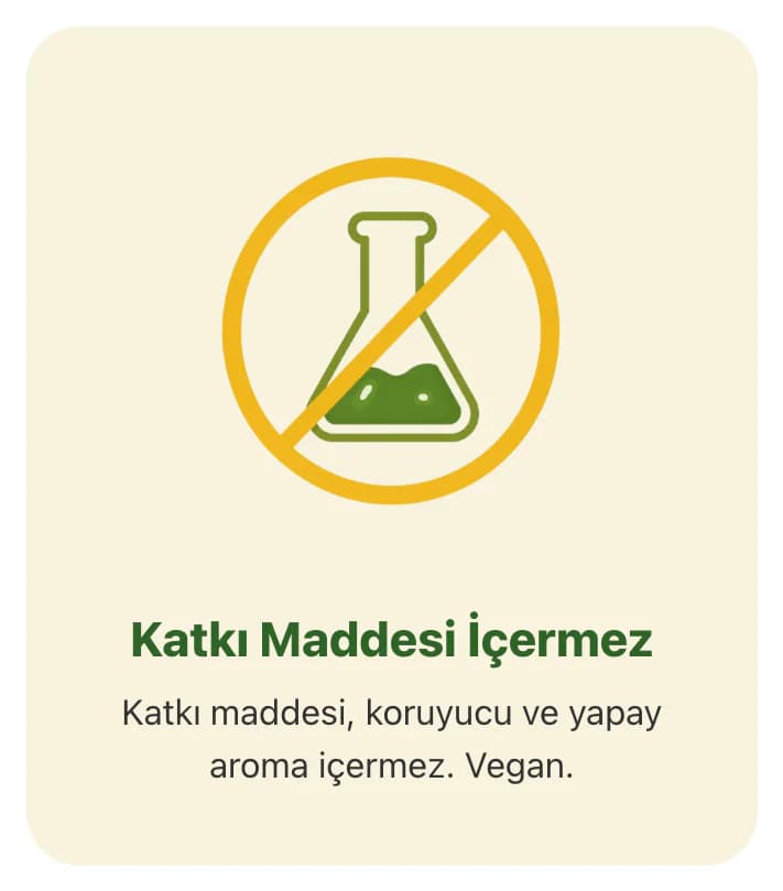 Tam ana sayfasındaki Neden Tam? kartlarından biri: krem zeminde sarı yasak işaretinin içinde deney şişesi simgesi, Katkı Maddesi İçermez başlığı ve katkı maddesi, koruyucu ve yapay aroma içermez, vegan açıklaması.