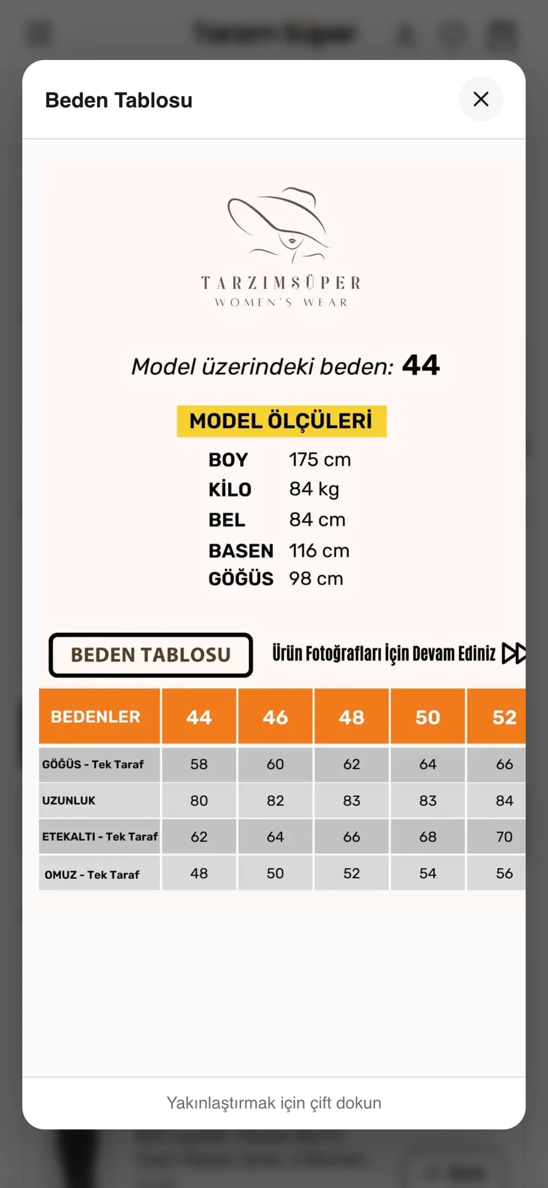 Tarzım Süper ürün sayfasında telefonda açılan Beden Tablosu penceresi: model üzerindeki beden 44 ve model ölçüleri (boy 175 cm, kilo 84 kg, bel 84 cm, basen 116 cm, göğüs 98 cm), altında 44'ten 52'ye bedenlere göre göğüs, uzunluk, etek altı ve omuz ölçüleri tablosu.