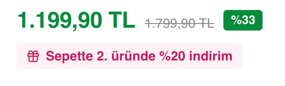 Tarzım Süper ürün sayfasında fiyat alanının yakın planı: yeşil 1.199,90 TL, üstü çizili 1.799,90 TL ve yeşil %33 rozeti; altında pembe zeminde hediye simgeli Sepette 2. üründe %20 indirim notu.